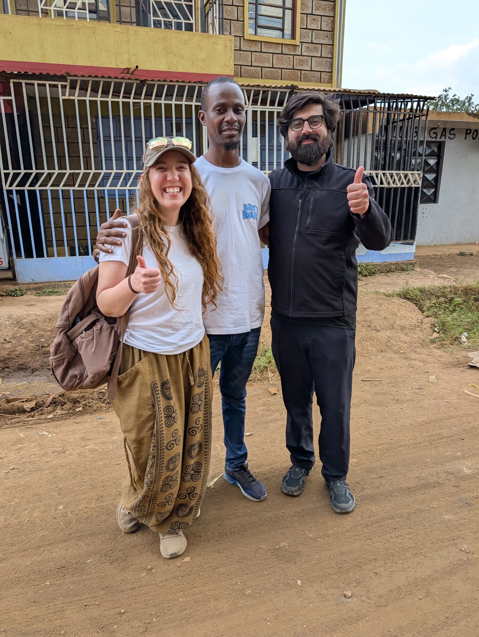 M.K. Fain, Dan of Bitcoin Babies, and Alex Gleason giving thumbs up in Matangi, Kenya