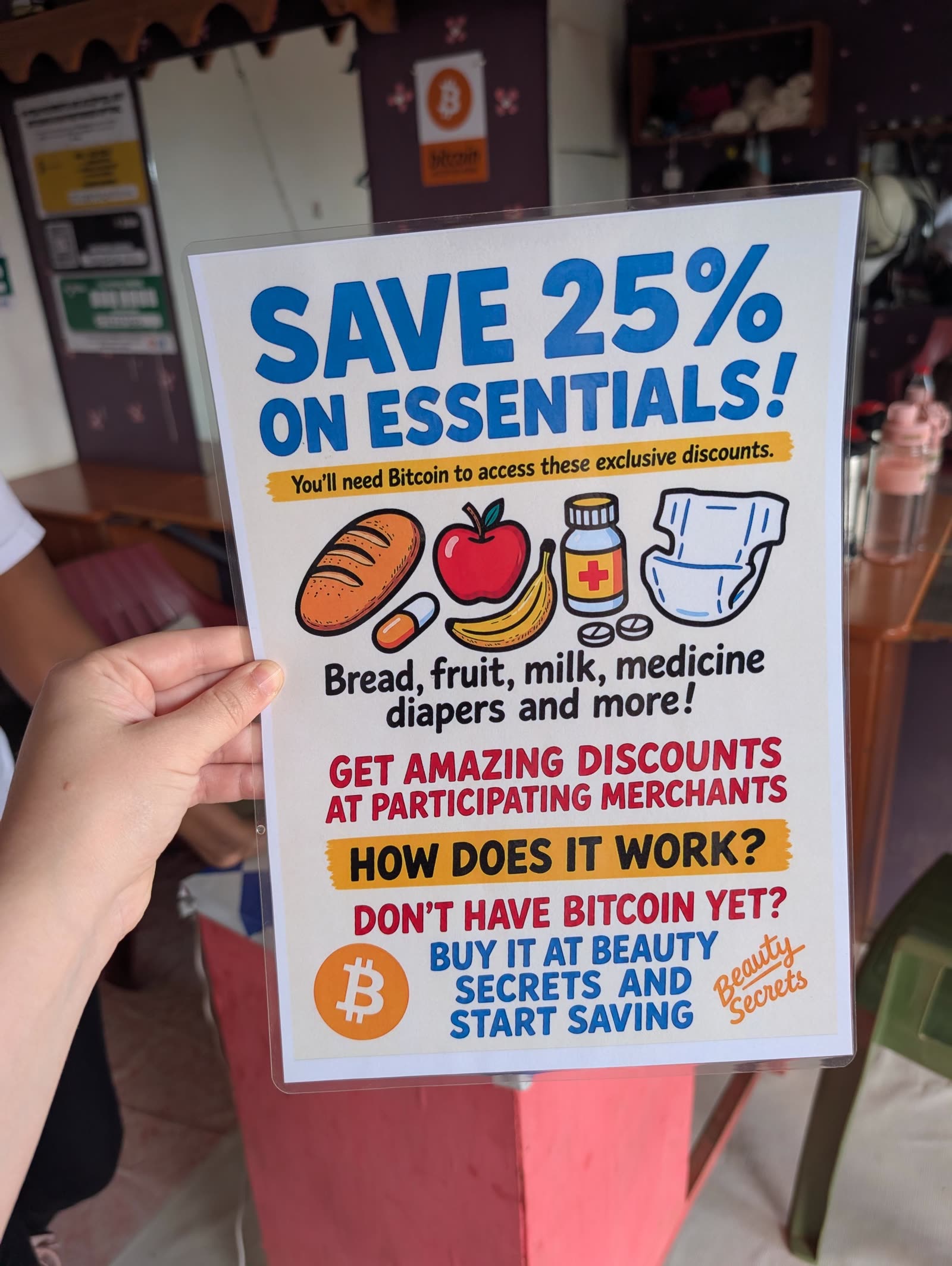 Flyer at a Matangi shop offering 25% off essentials like bread, fruit, milk, medicine, and diapers when paying with Bitcoin